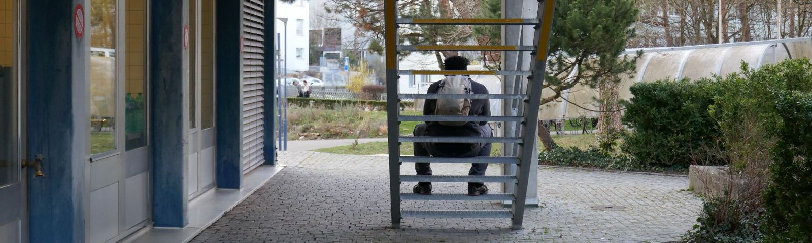 Geflüchtete Person in einem Asylzentrum